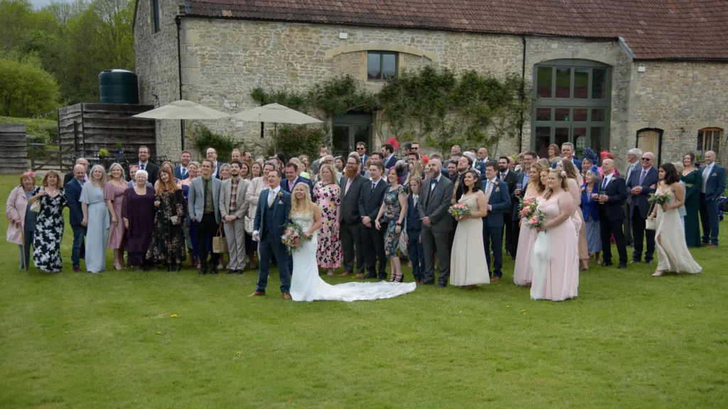 Group wedding photo captured by Dick Lloyd Photography