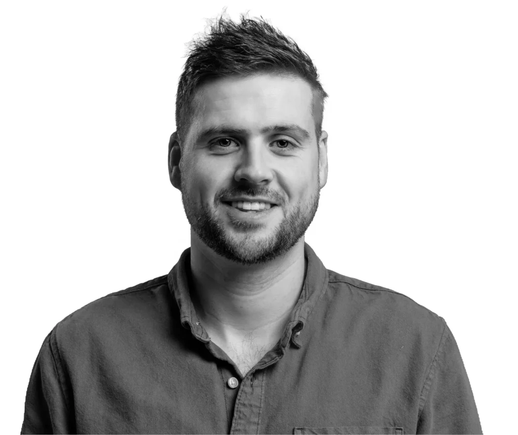 Corporate headshots in Harrogate - monochrome iof a man wearing a casual shirt on a whte background