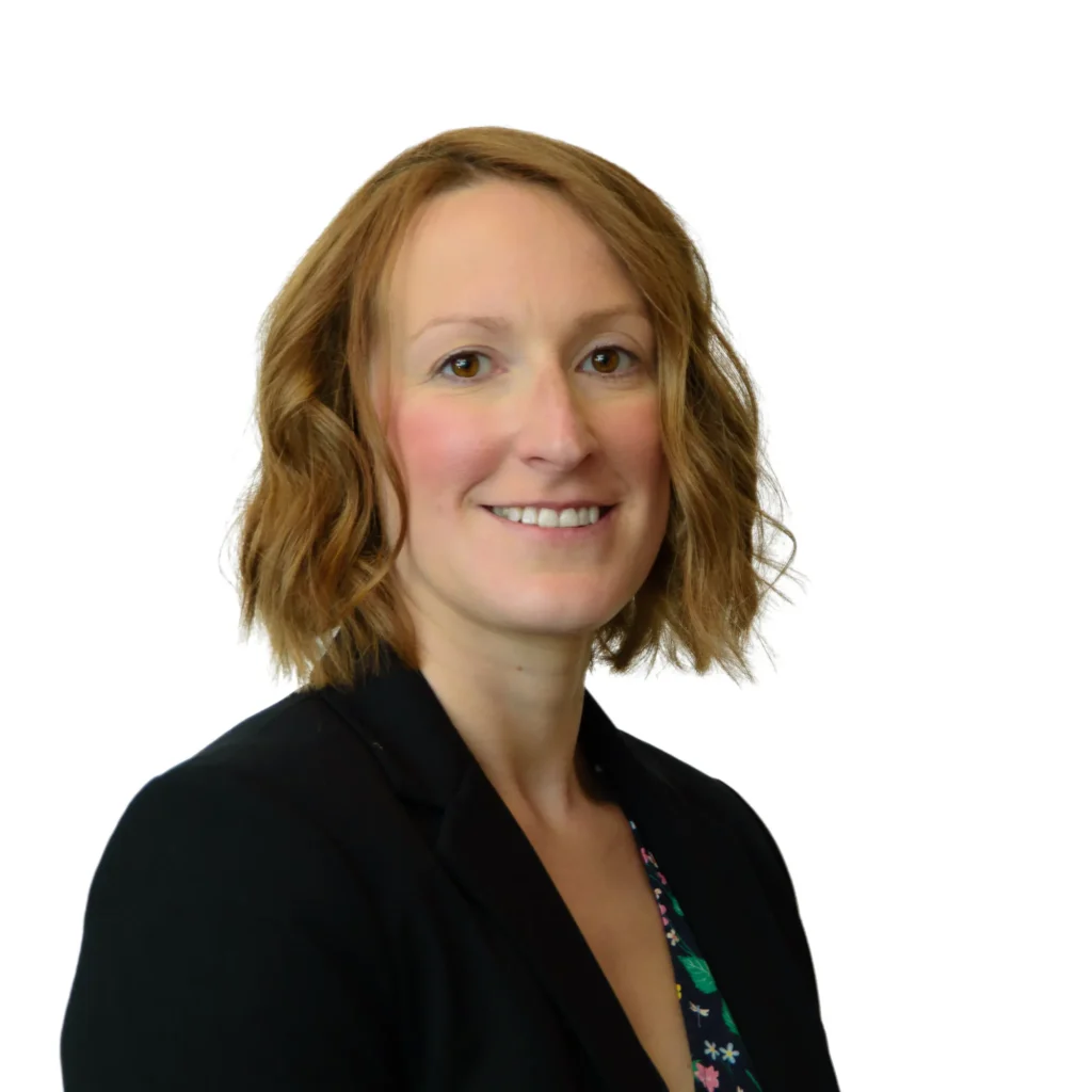 Businesswoman wearing dark top - headshot with white background