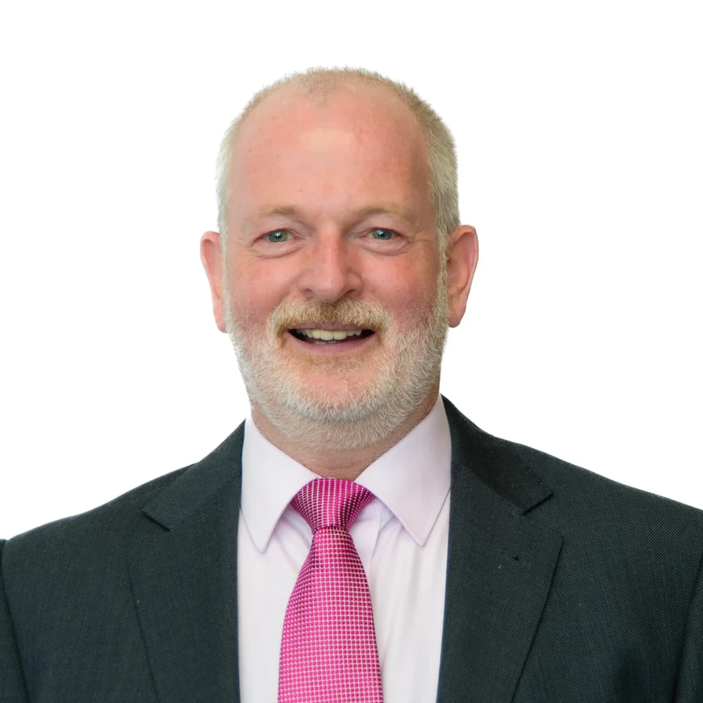 Businessman wearing dark suit with bright pink tie - headshot with white background
