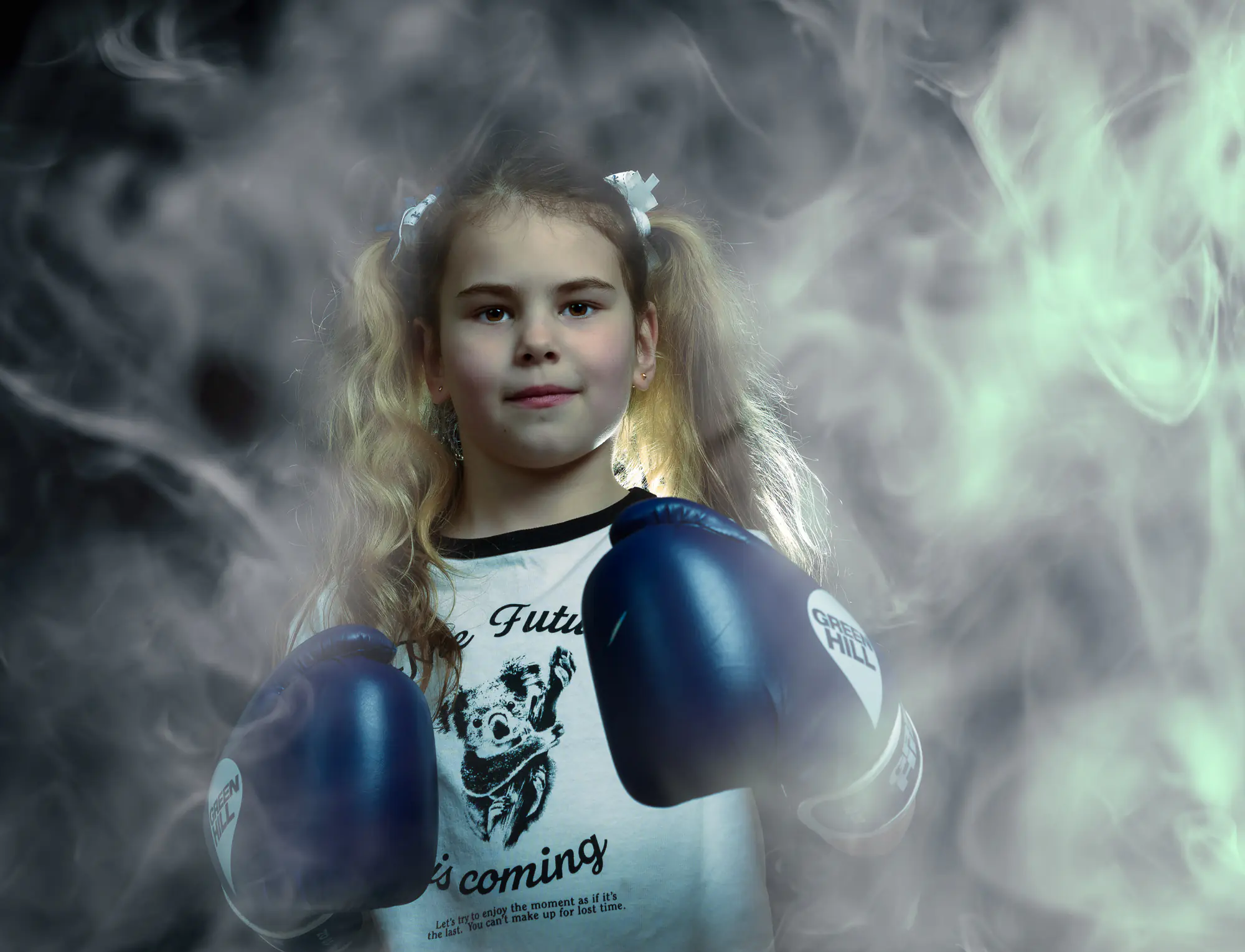 Portrait of a young girl boxer with smoke effect background by Dick Lloyd Photography