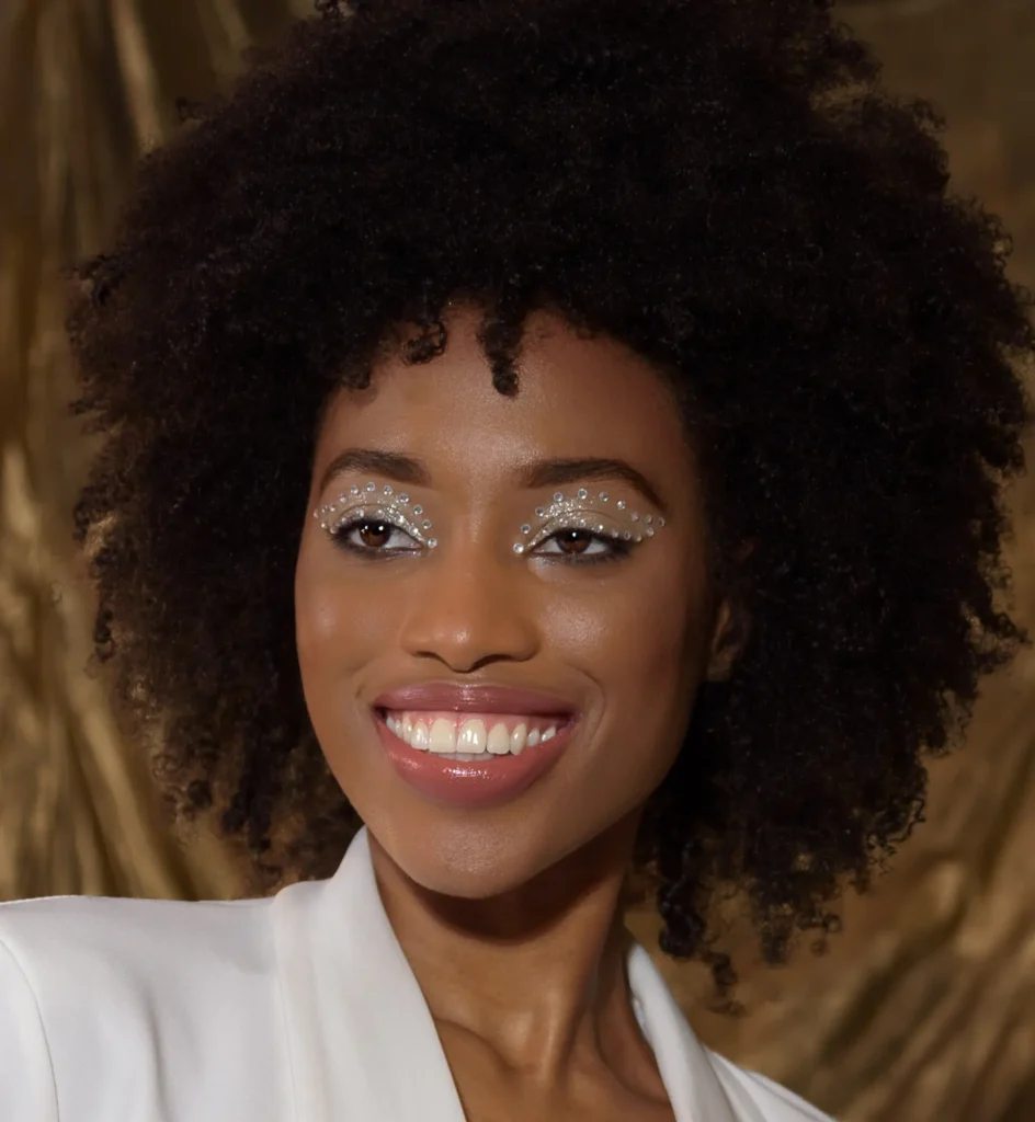 Winter Wonderland-4237-Edit Headshots for acting: smiling Black female model in studio — portfolio shot by Dick Lloyd Harrogate