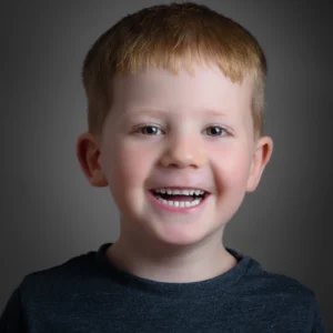 Young boy who is very happy