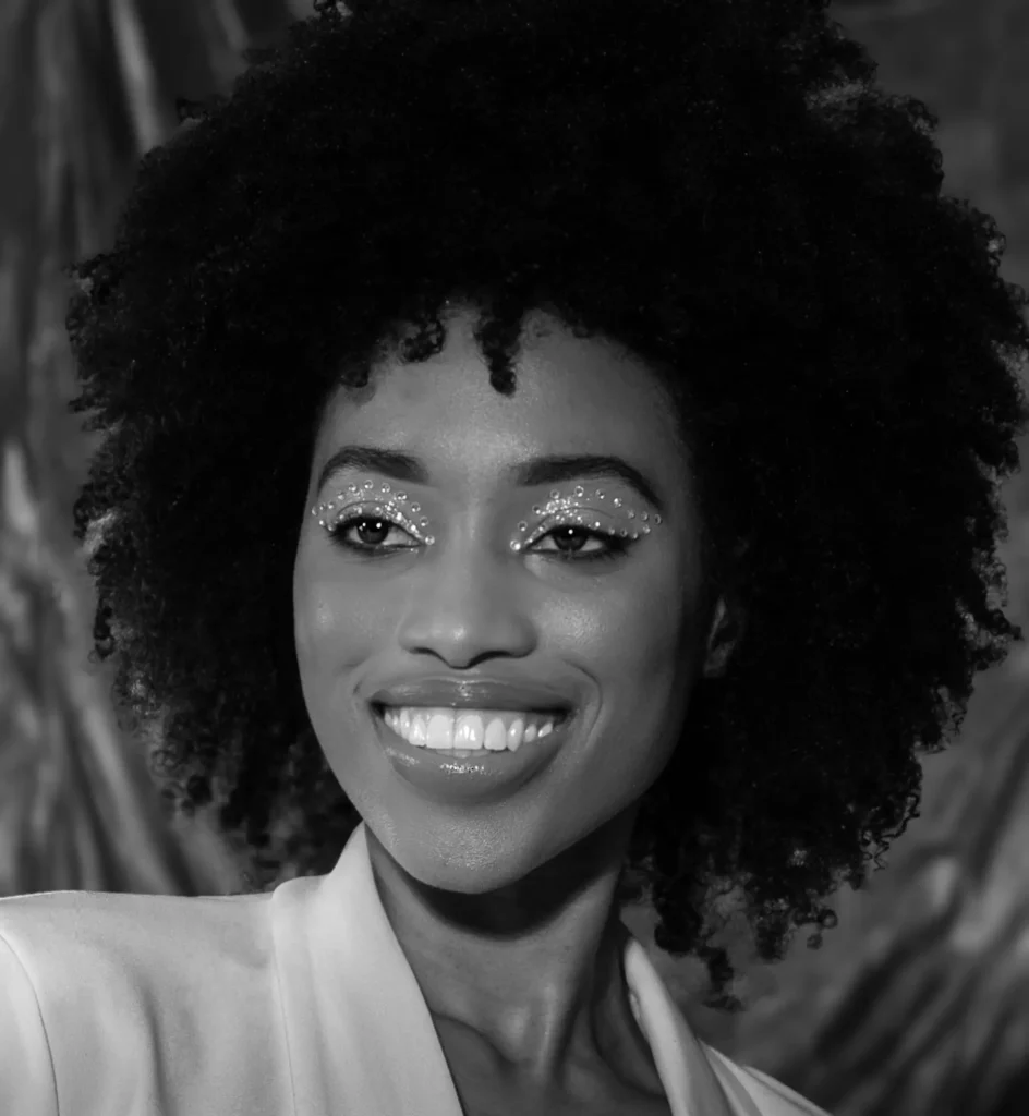 Black & white headshot of a smiling confident actress by Dick Lloyd Photography